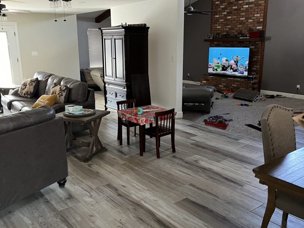 Living room with wood-look plank flooring